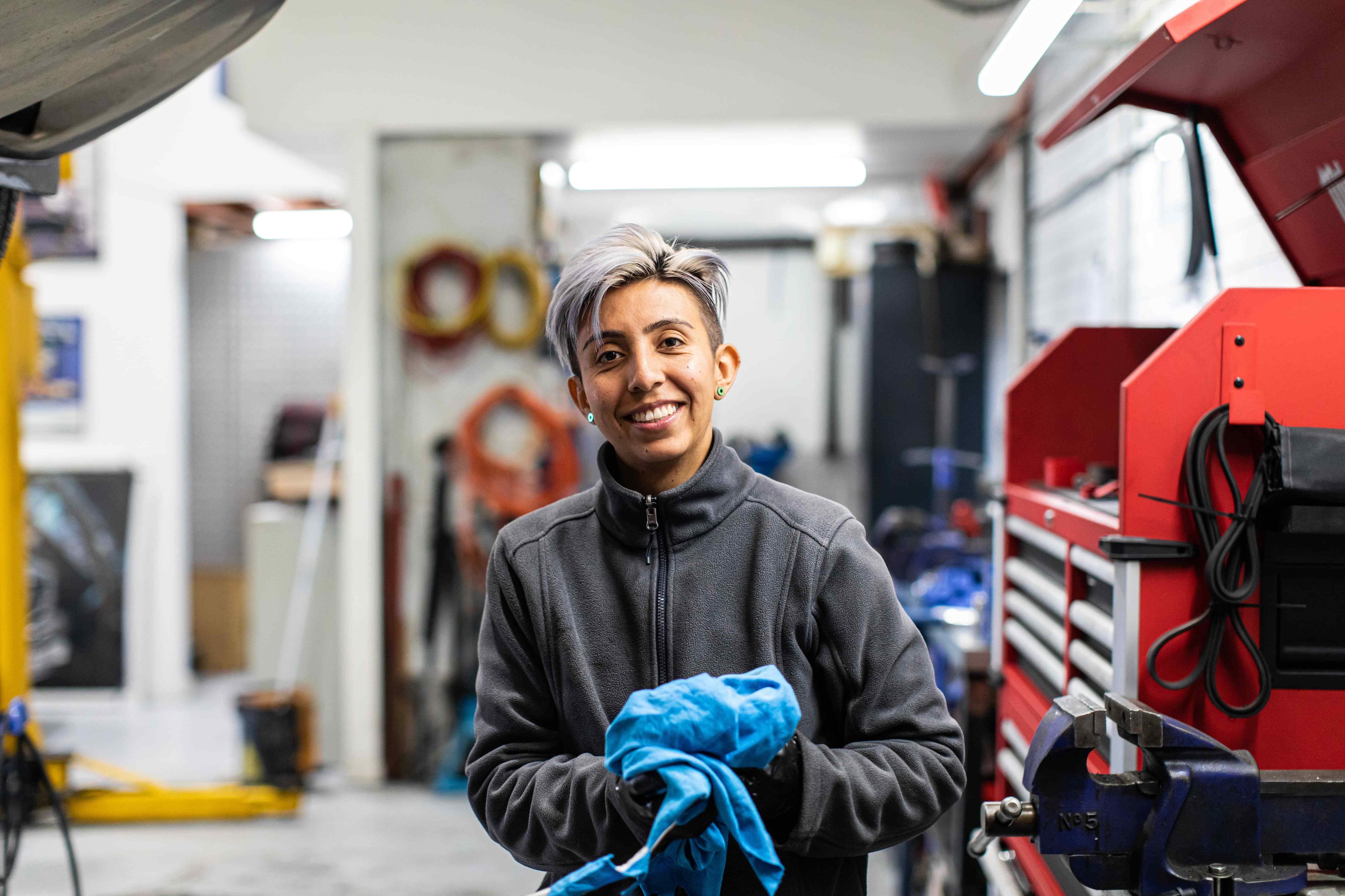 A female mecanic in her workshop - Pearson TalentLens