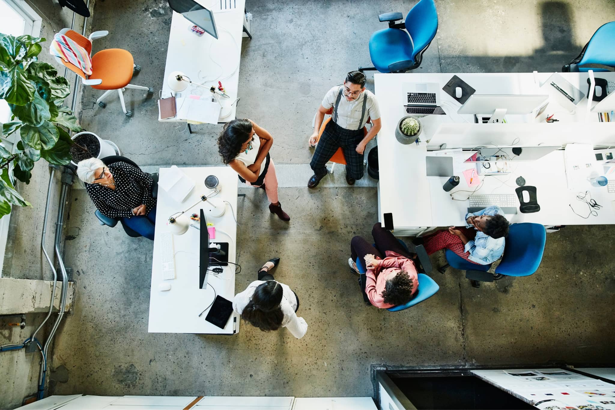 A group of coworkers  in an office - Pearson TalentLens