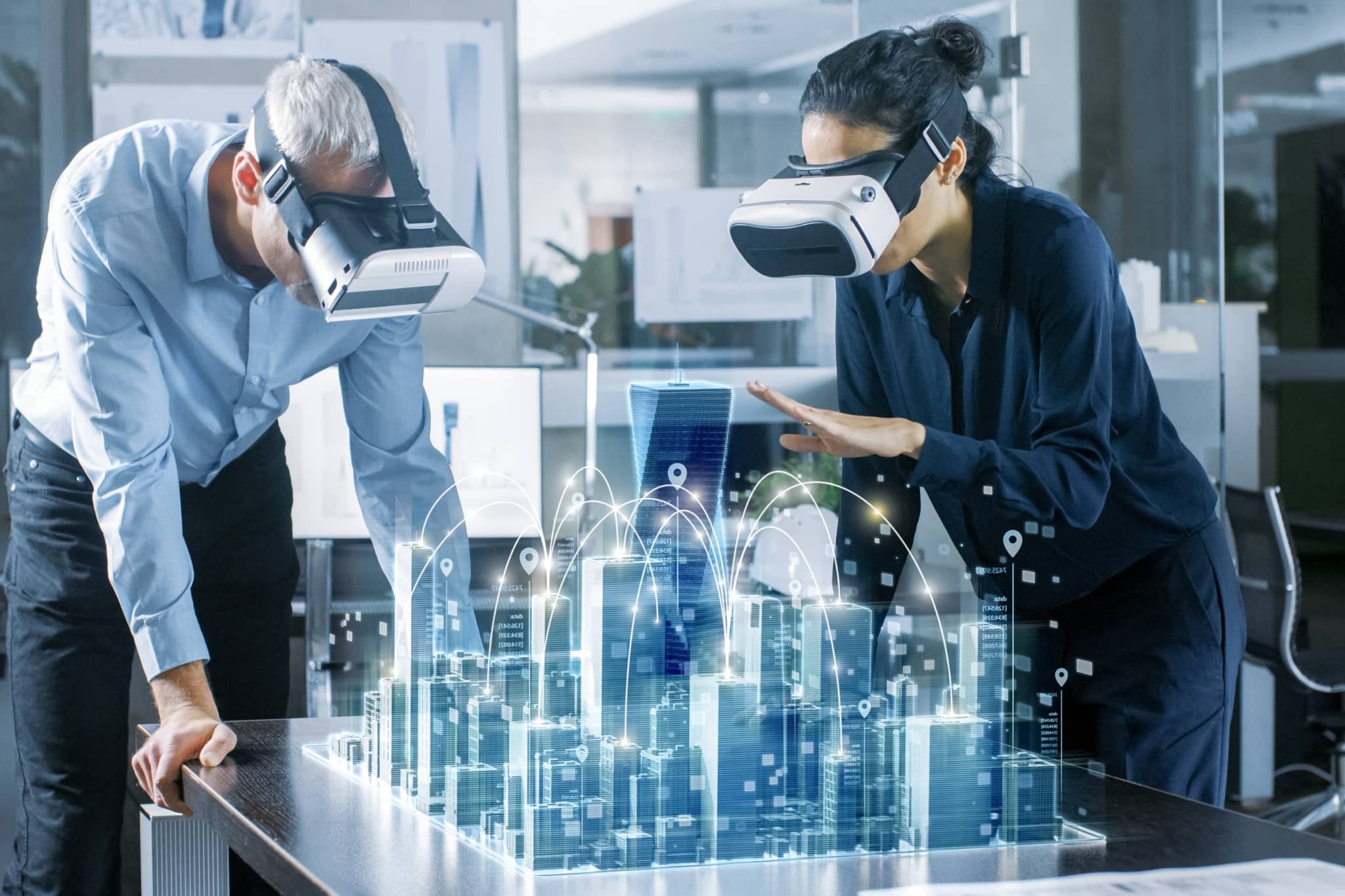 AI Metaverse - two colleagues using headsets to look at VR City - Pearson TalentLens