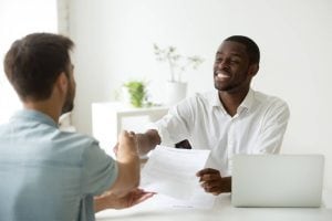 Recruitment Interview - colleagues shaking hands - Pearson TalentLens