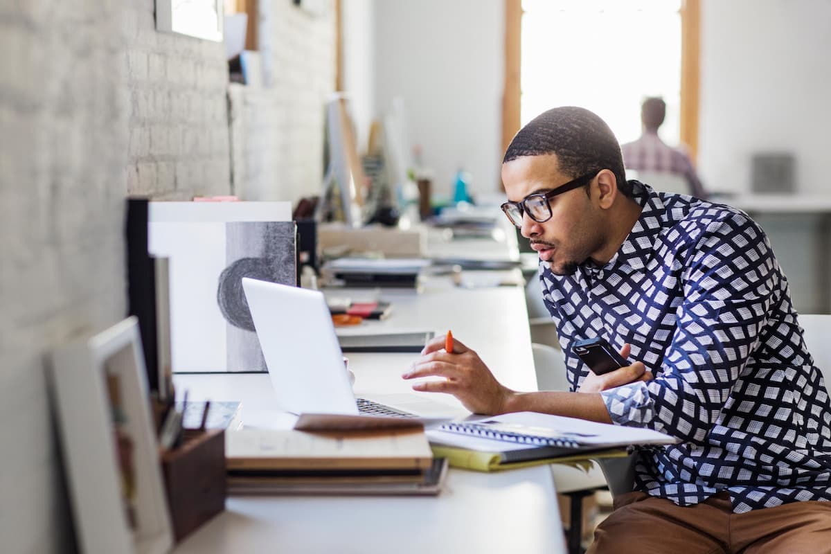 man-at-laptop-working-office